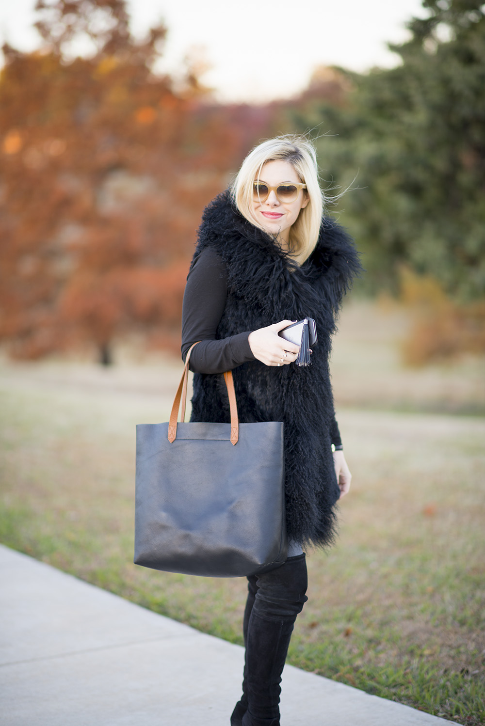 how to style a black fur vest Allyson in Wonderland