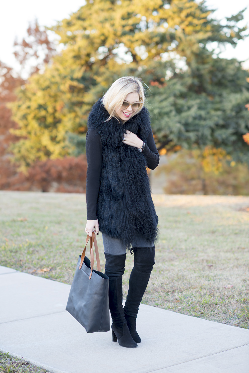 how to style a black fur vest Allyson in Wonderland